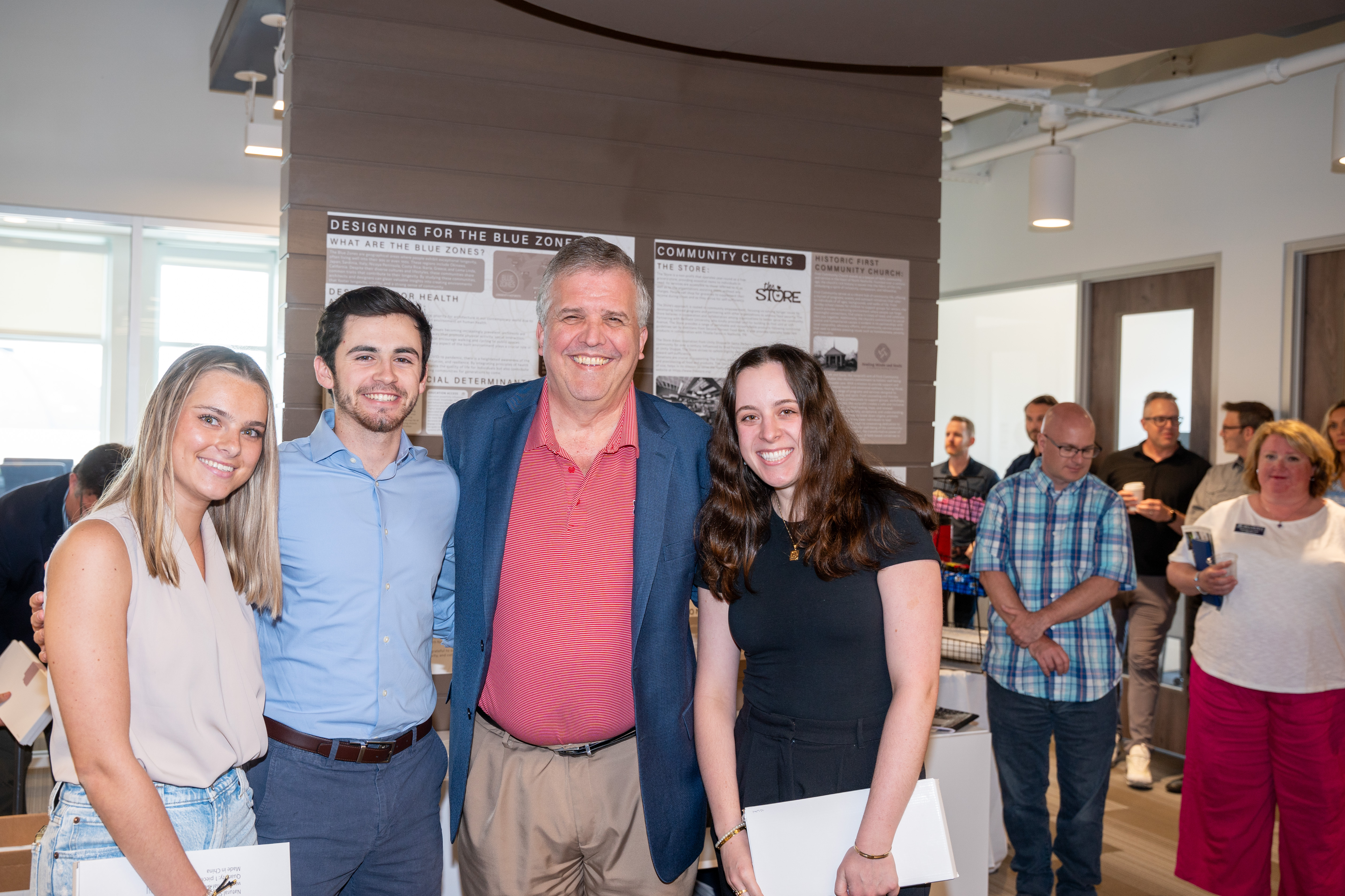 Design team pictured with University President Dr. Greg Jones