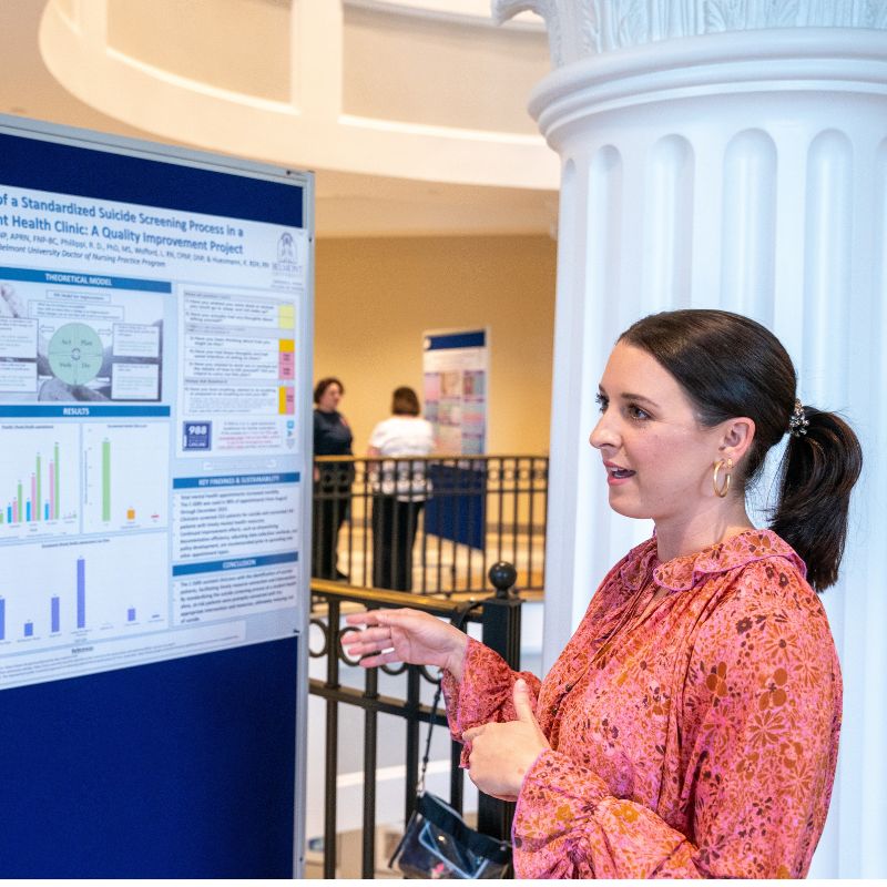 A student presents their research to a classroom of other students