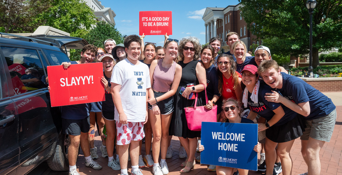 Students welcome new families to campus