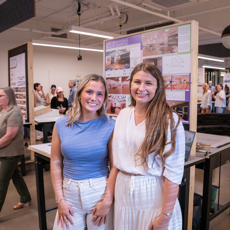 two O'More students smile at art crawl