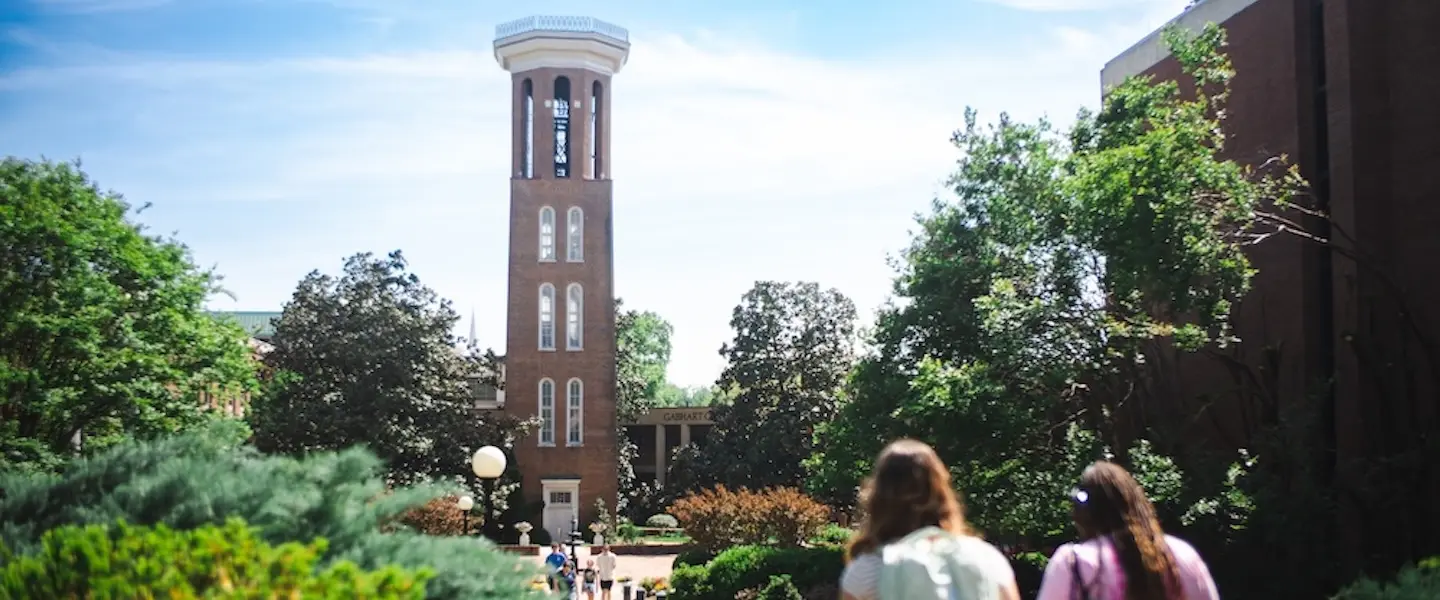 Image of students walking to the bell tower 