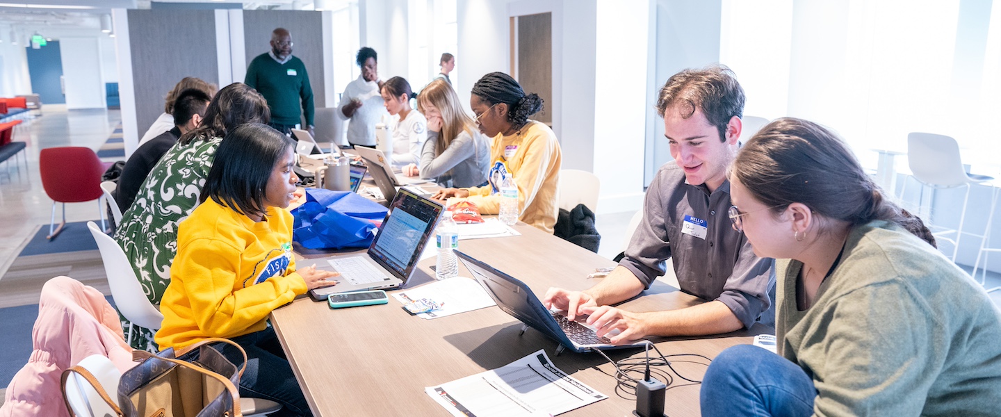 Students researching for the Fisk-Belmont Social Justice Data Hackathon 2024