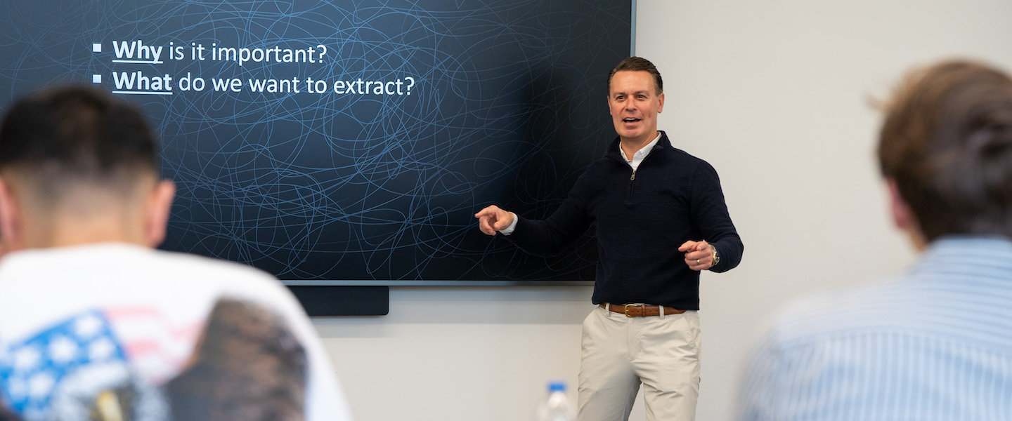 Professor teaching business students