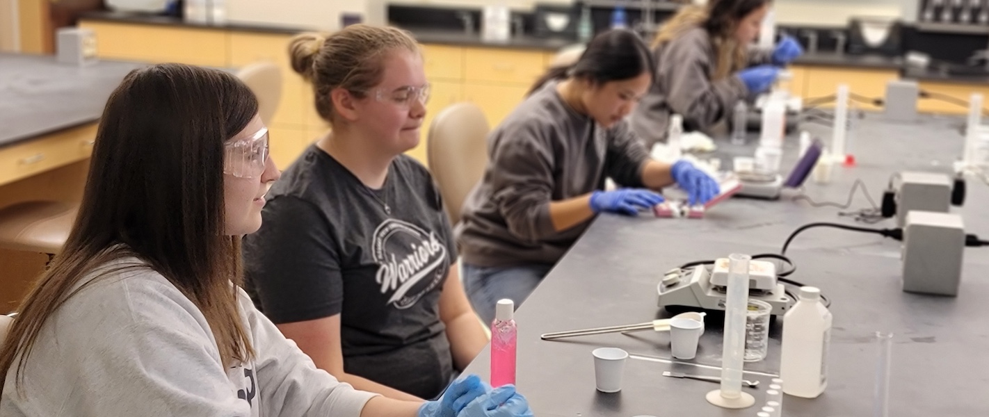 High school students make their own chapstick at Belmont's pharmacy workshop