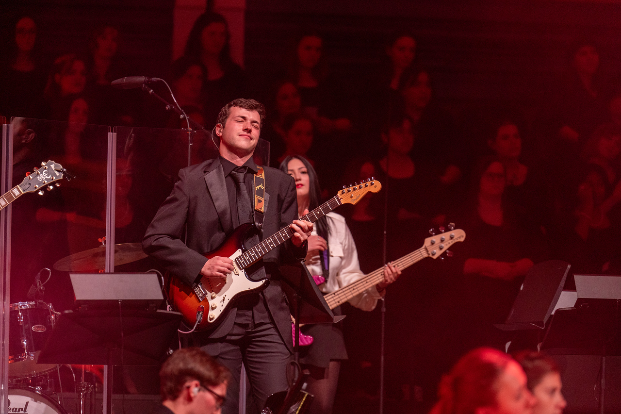 student playing guitar