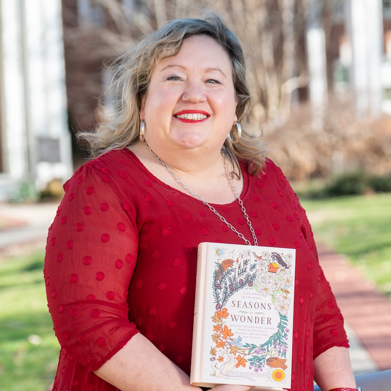Dr. Bonnie with her book, Seasons of Wonder