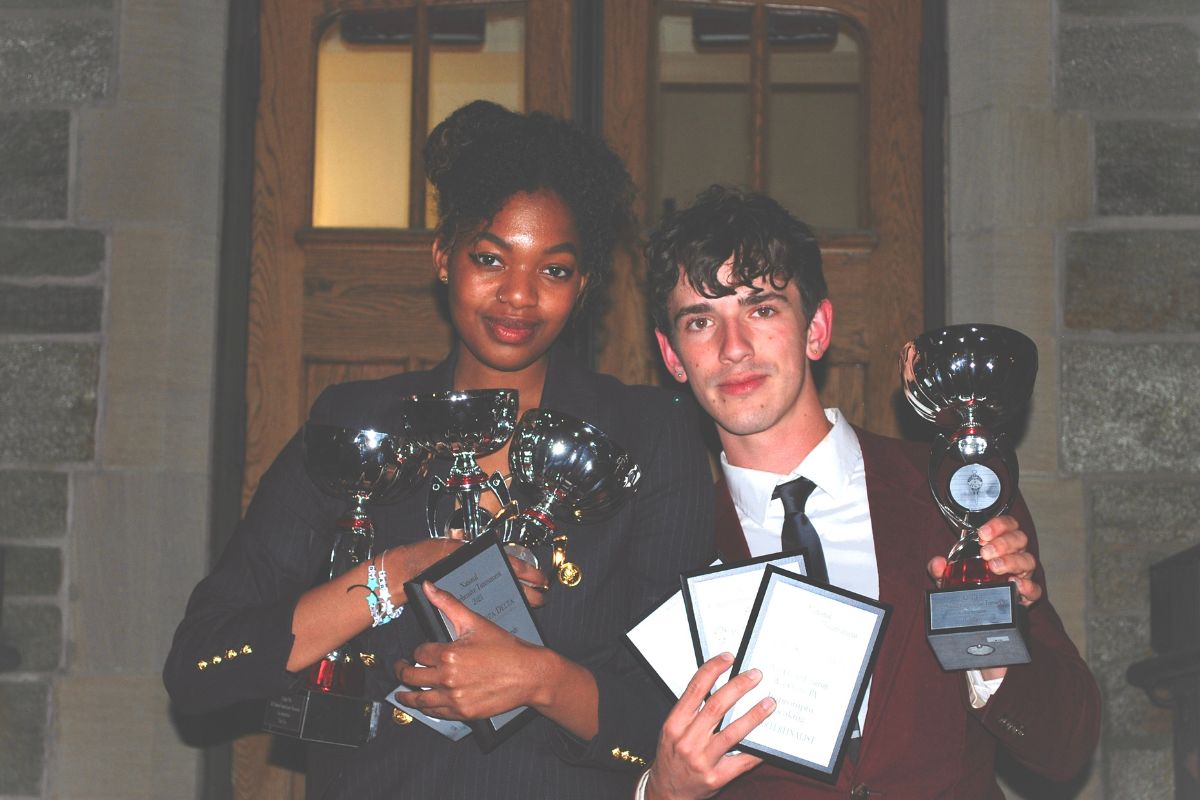 Alisa Osborne and Aaron Kleinschmidt at the Pi Kappa Delta National Comprehensive Speech and Debate Tournament in 2023
