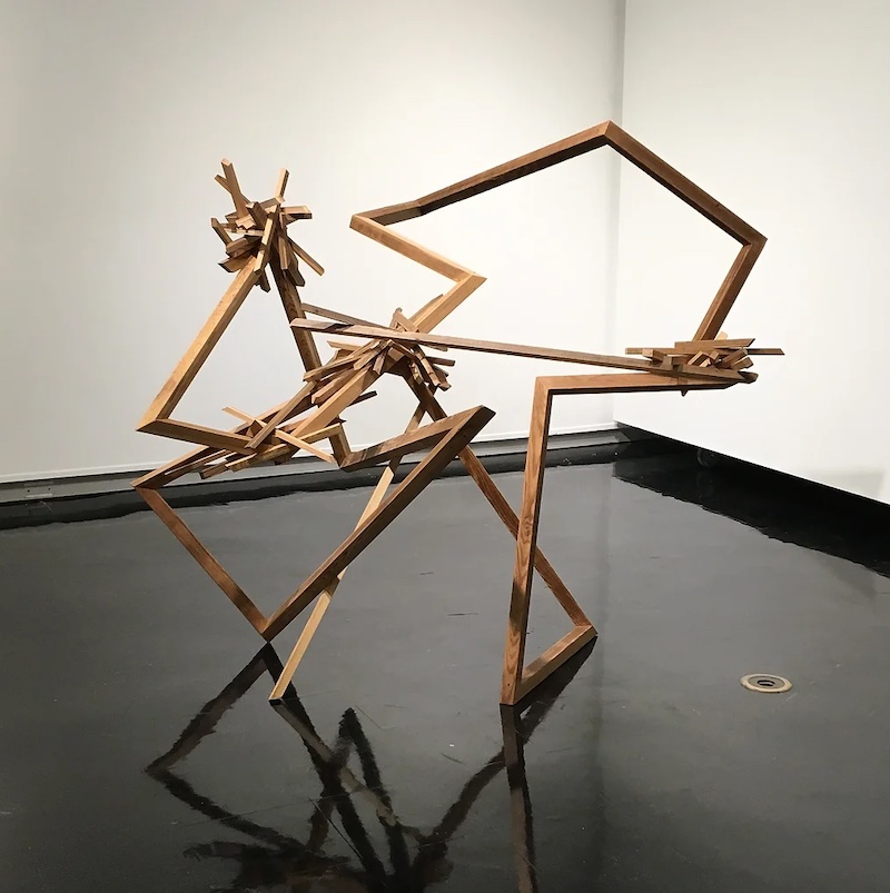 "Cygnus Loop" art piece made of reconstructed wood twisted around itself
