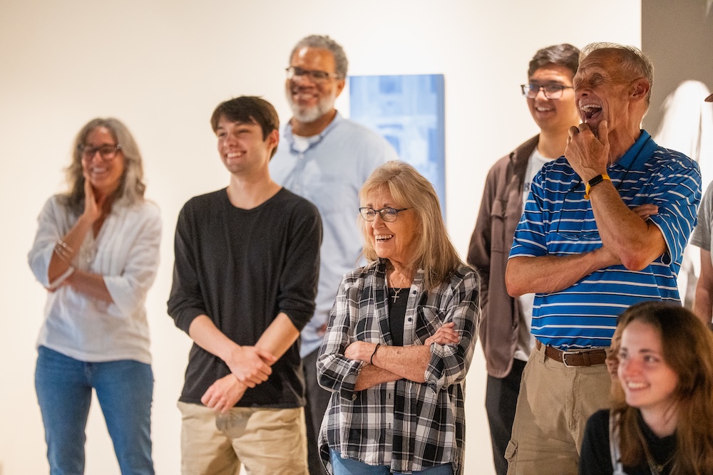 Smiling faces at the closing reception
