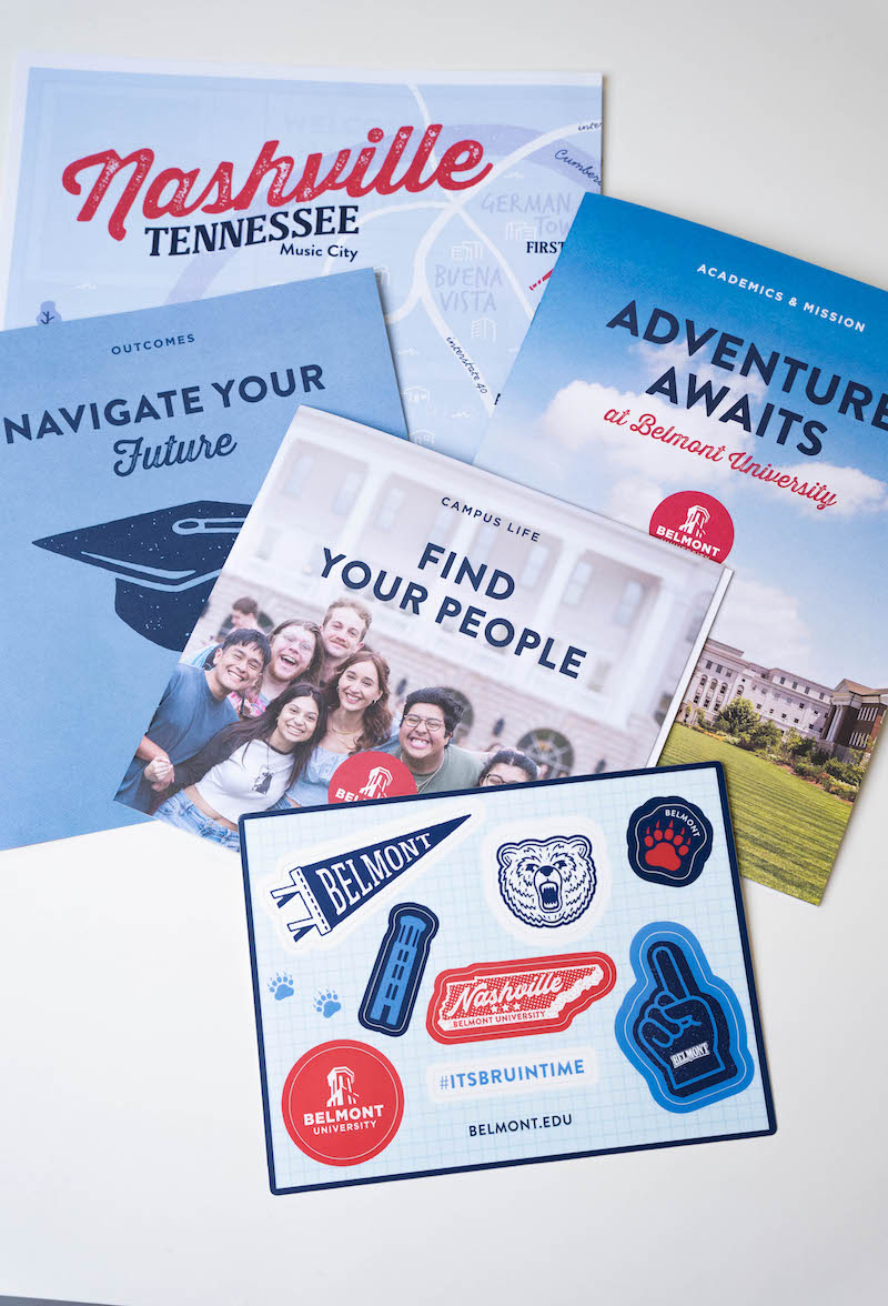 Shows the Admissions Senior Viewbook Packet with its "adventure" theme.