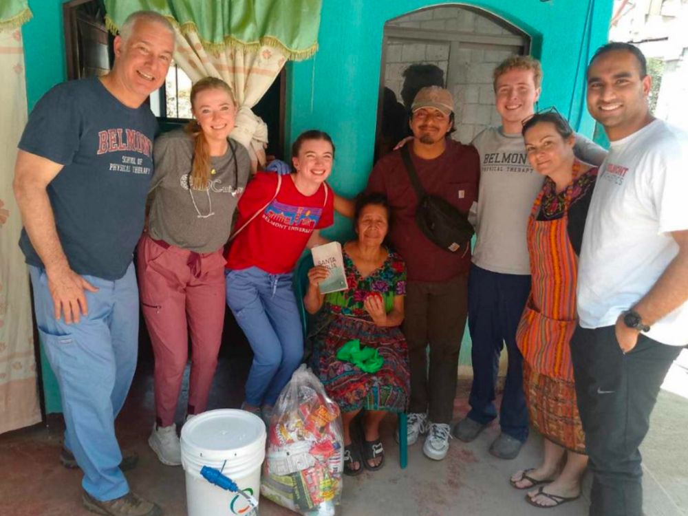 Students and faculty connect with a local in Guatemala