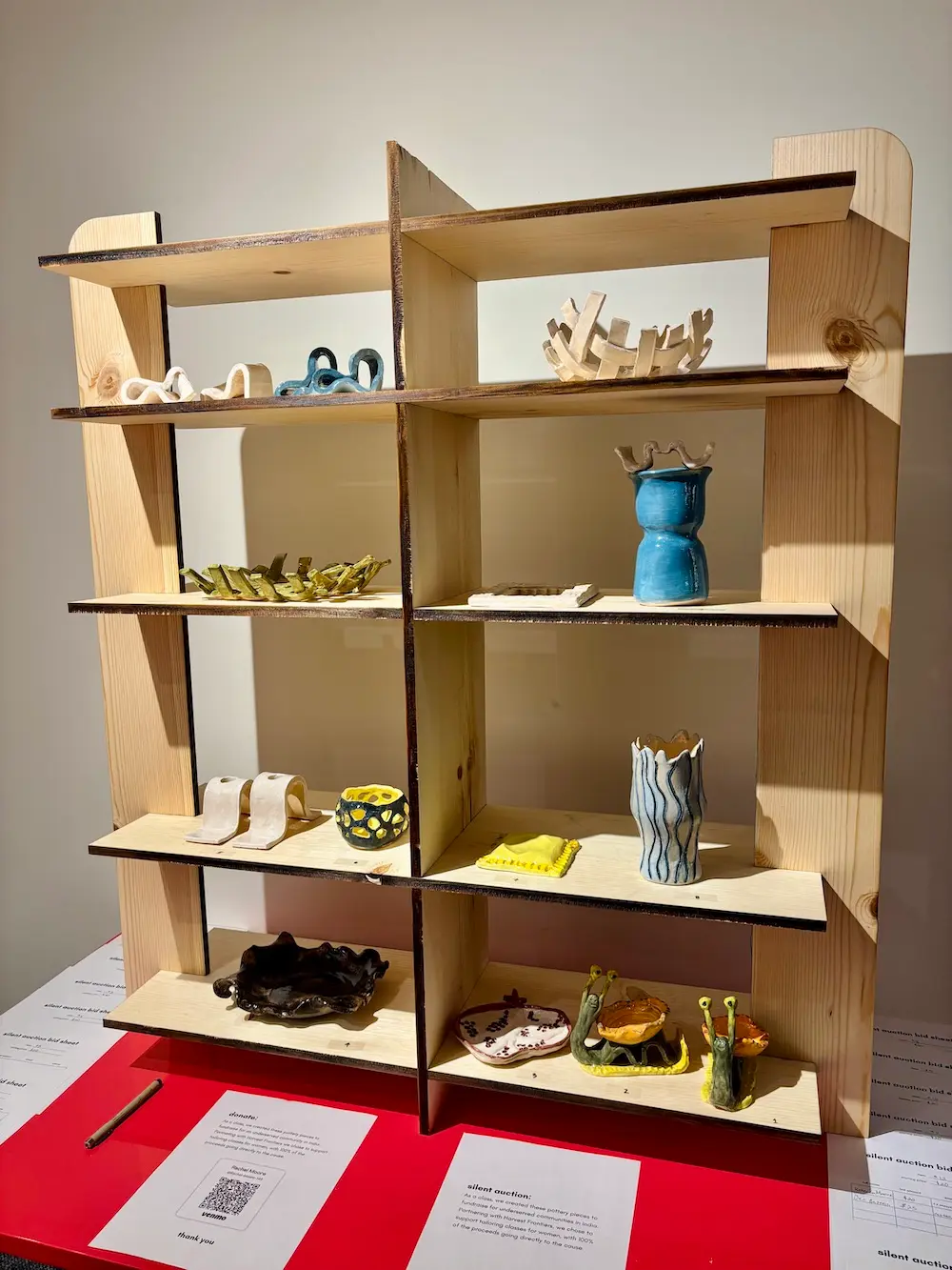 Moore's flatpack shelves hold the workshop pottery the O'More interior design students