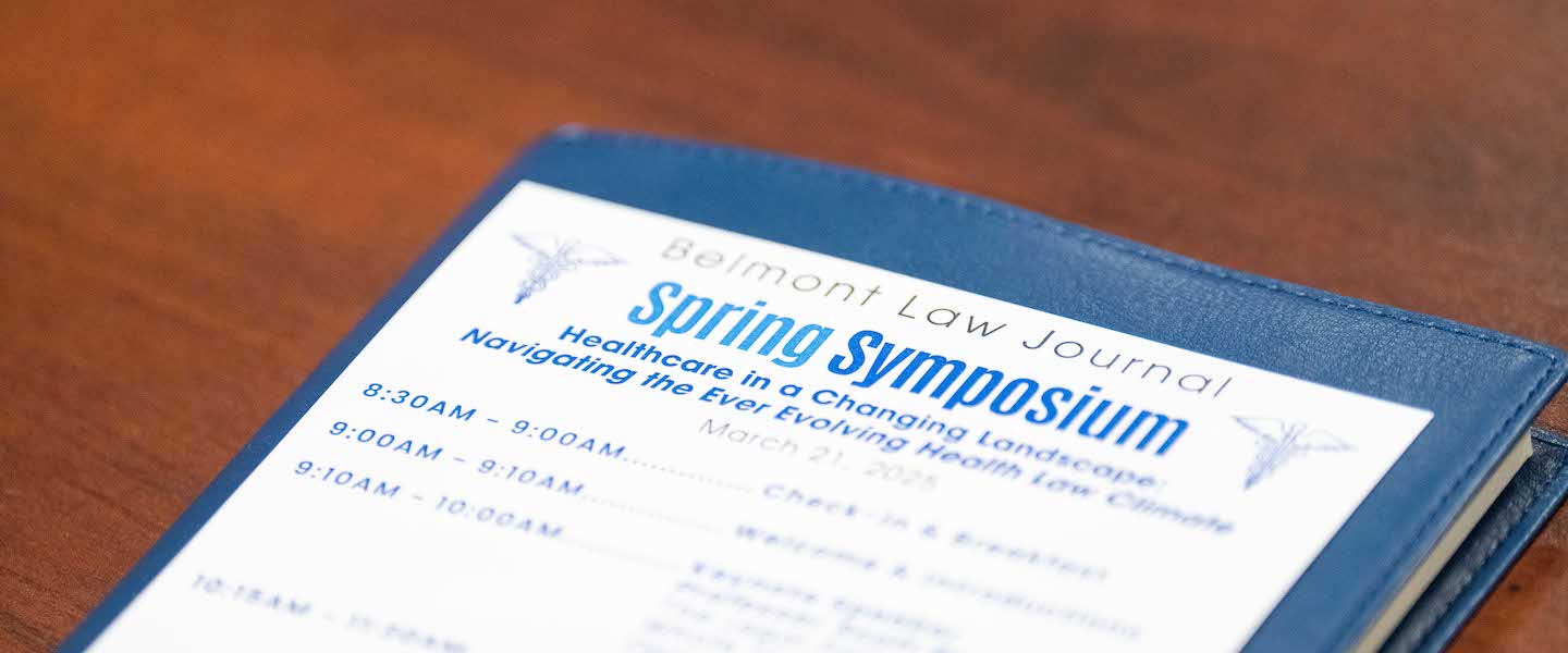 Symposium agenda on table