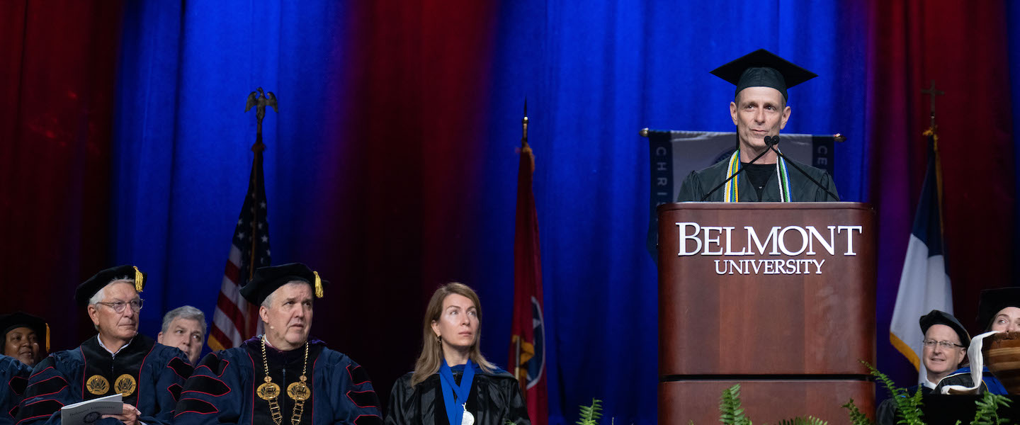 Mike Stanfield at graduation podium