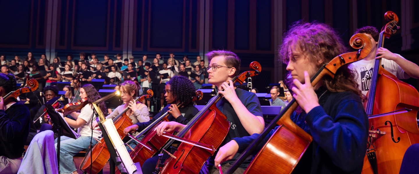 Eugene Kohen conducts the orchestra