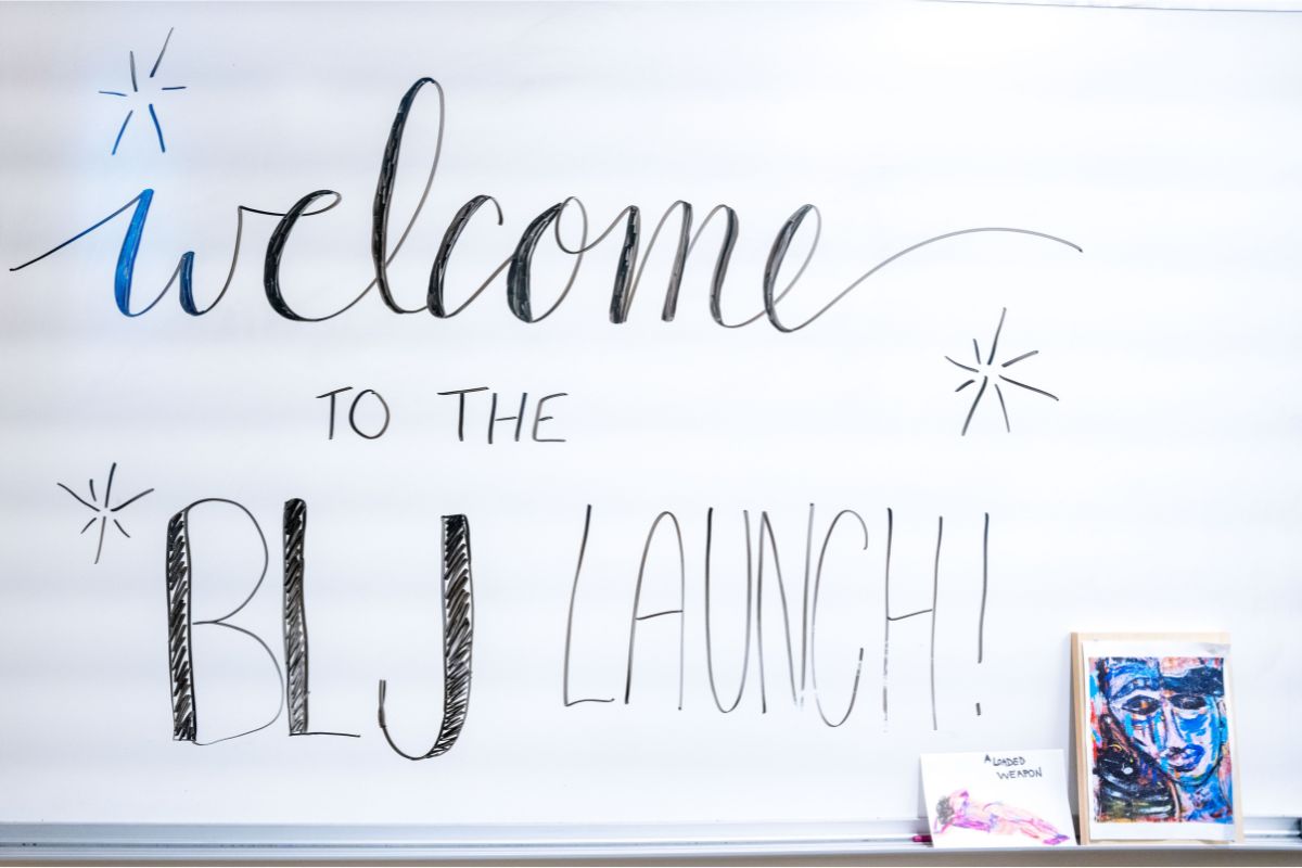 Whiteboard reads "Welcome to the BLJ Launch"