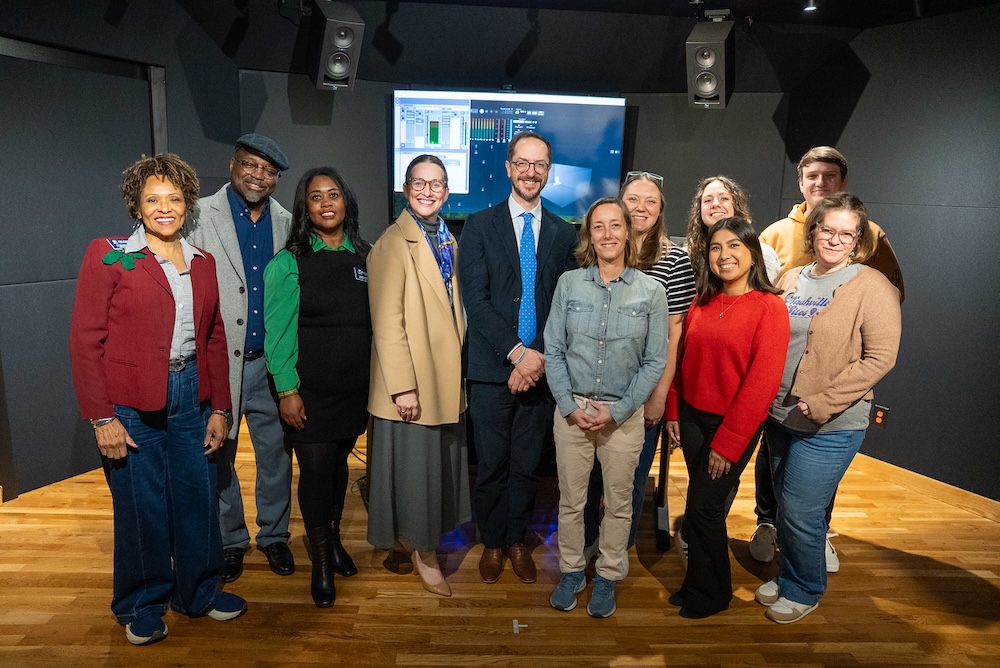 full group at recording studio