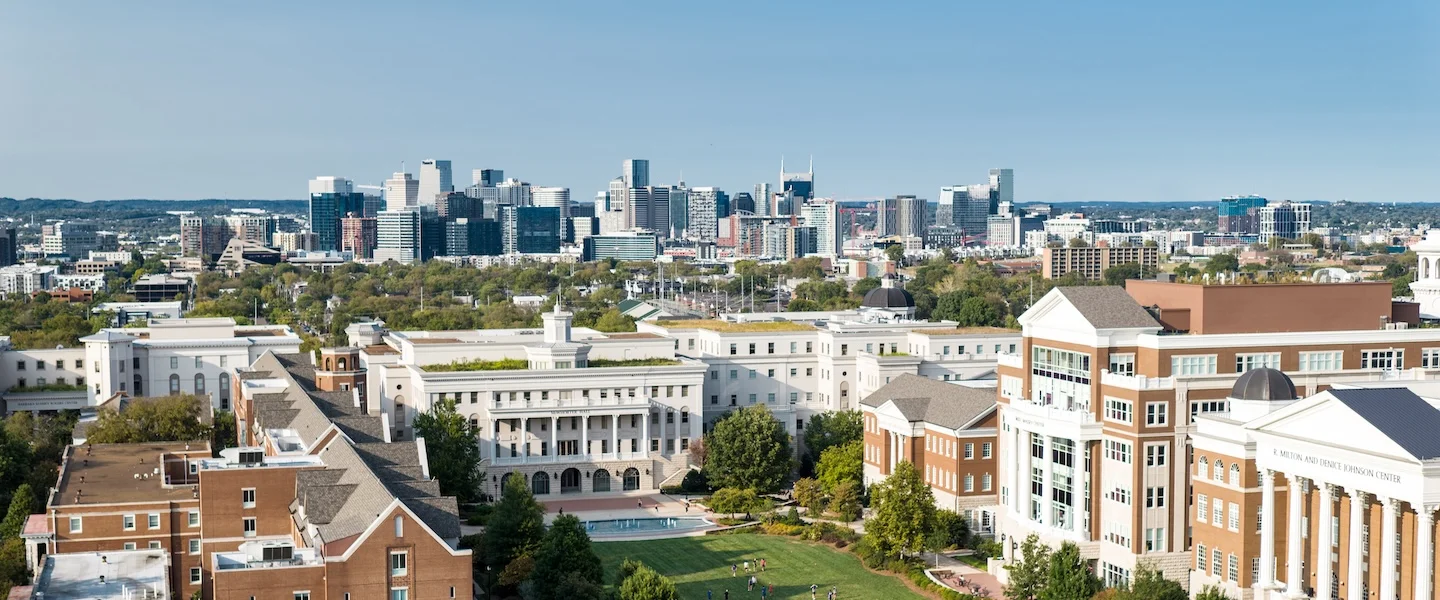 drone photo of the Belmont lawn with the Nashville skyline in background