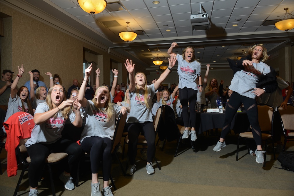 women's basketball team celebrates