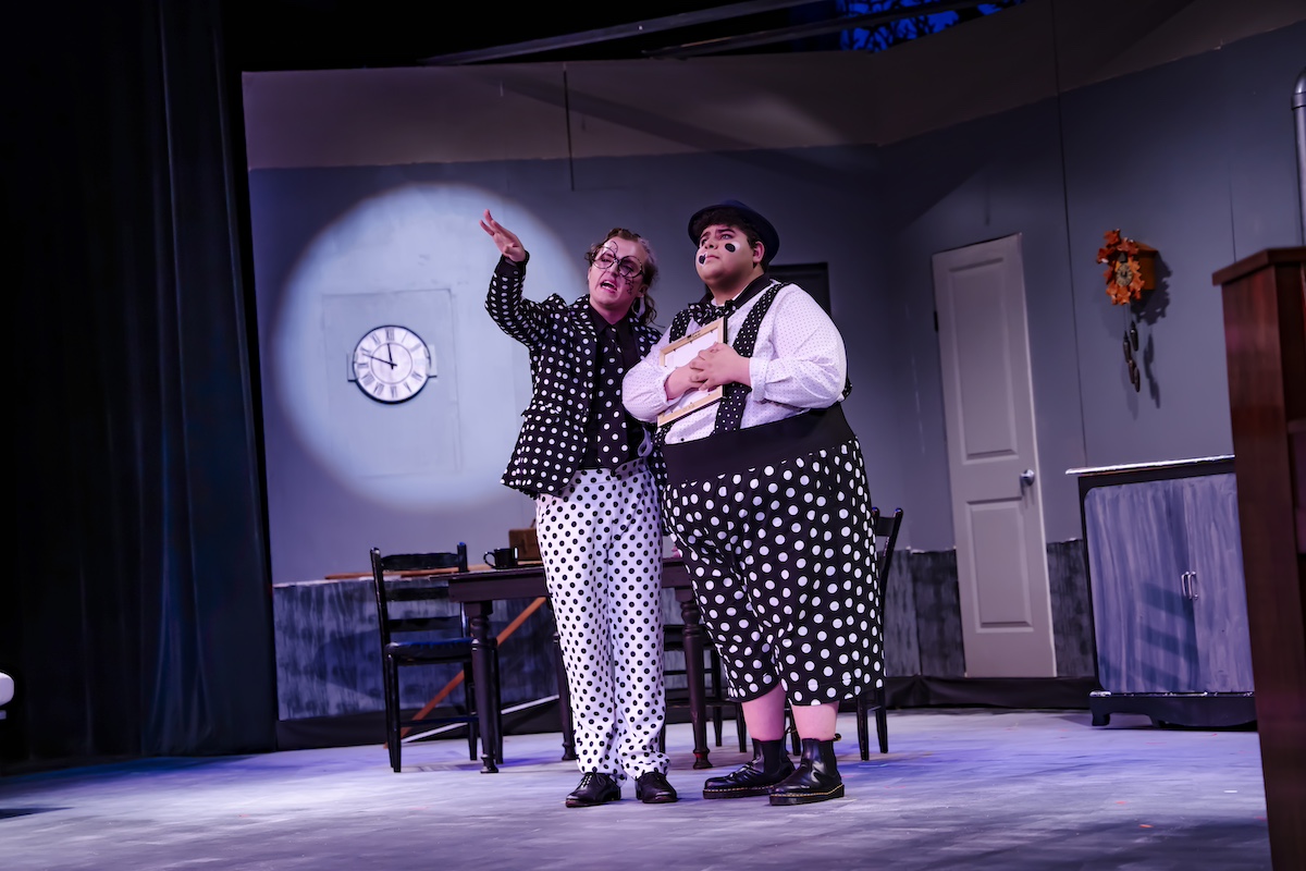 two students performing in "Pinocchio" opera