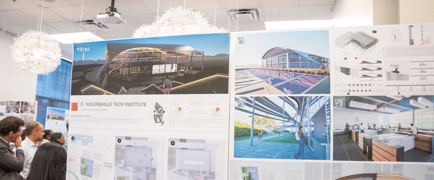 Architecture exhibit showcases student design boards as guests observe proposals for Nolensville Pike redevelopment.