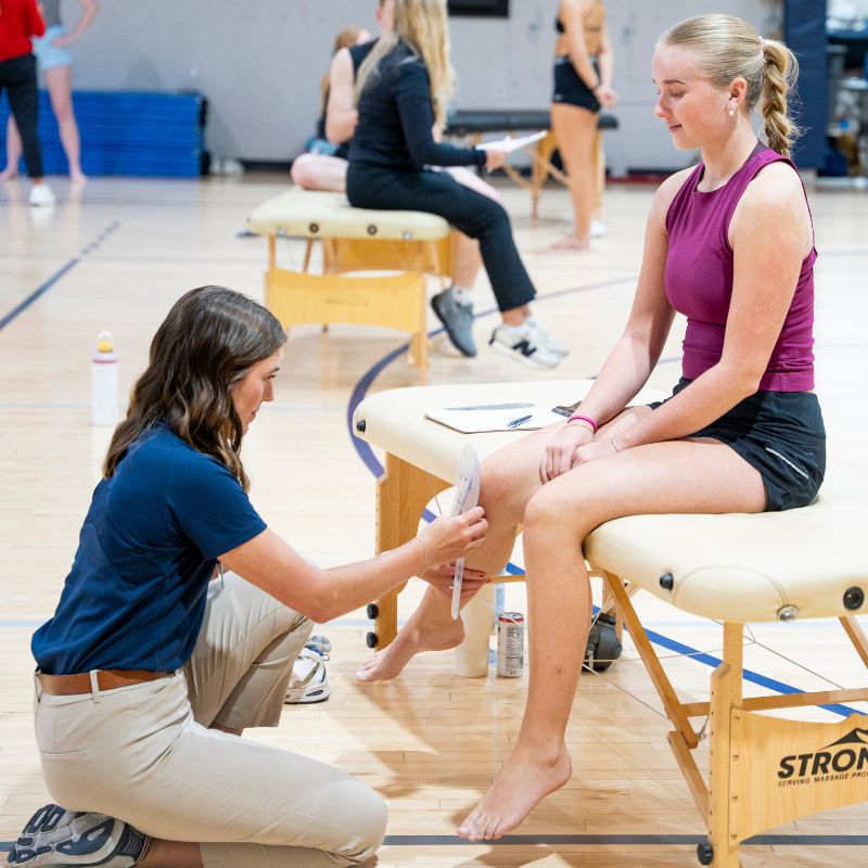 DPT student assists a dancer 