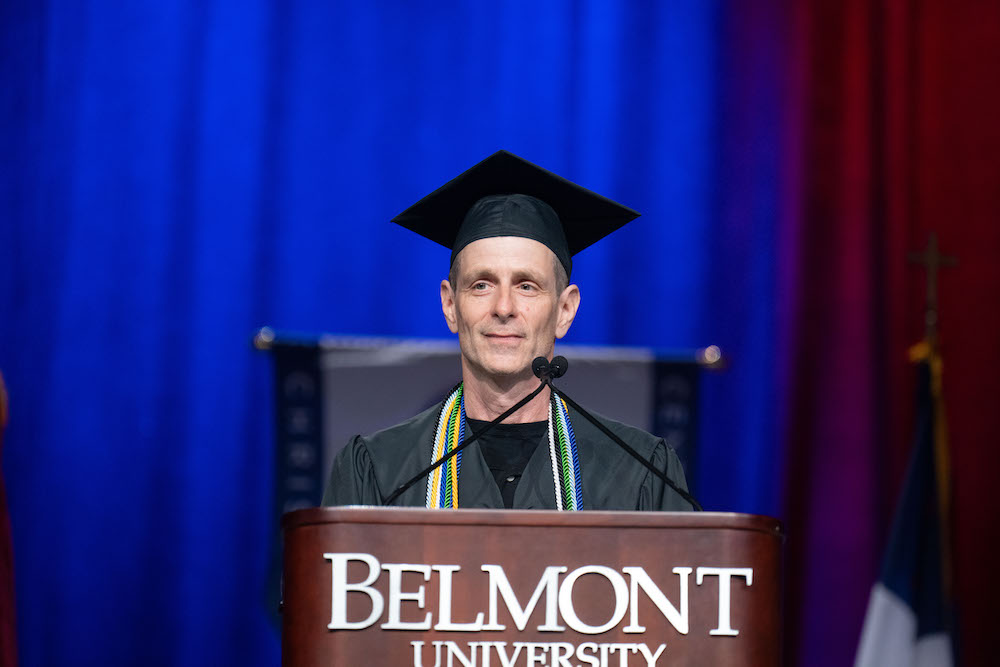 Mike Stanfield at graduation podium