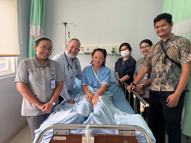 Busby with hospital staff