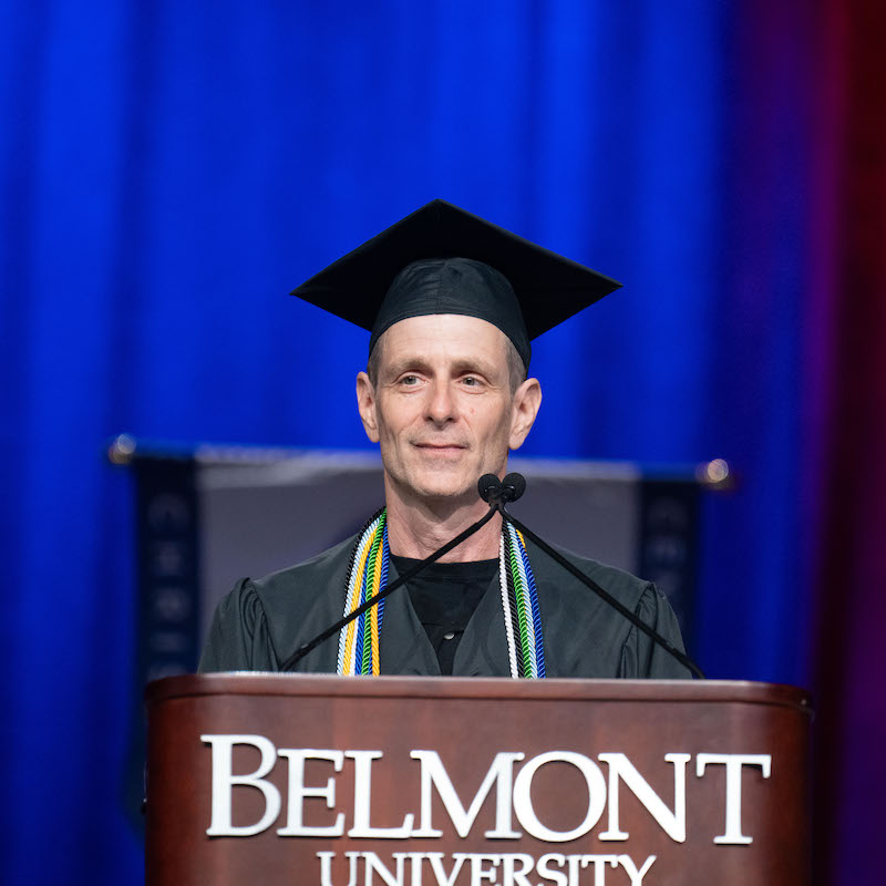 Mike Stanfield at graduation podium
