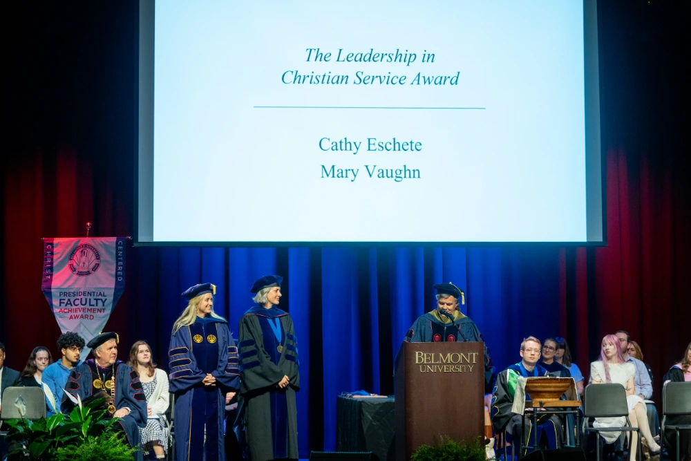 Drs. Eschete and Vaugn accepting their awards