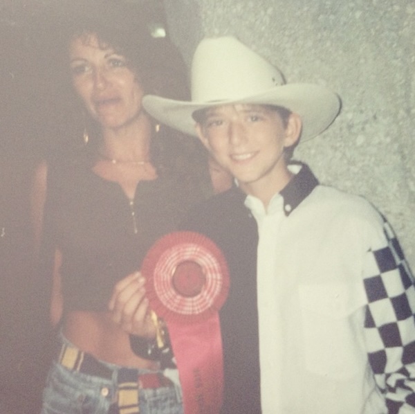 Adam as a teenager with his mom