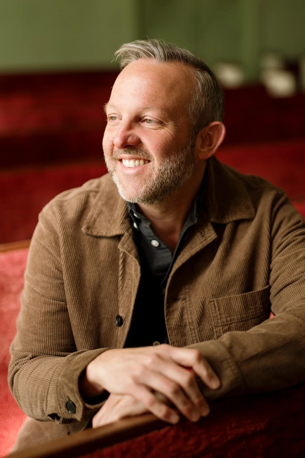 A headshot of Andrew Greer