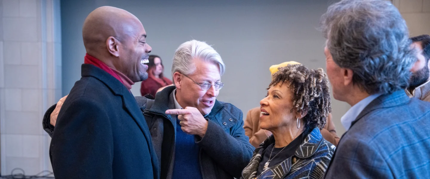 people greeting each other in chapel