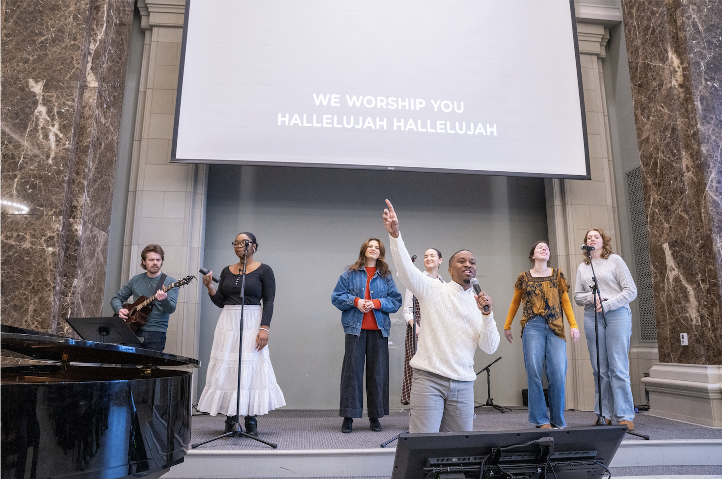 A group of musicians performing worship songs