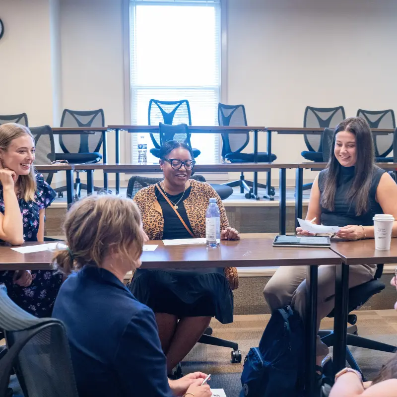 students in classroom having a discussion 