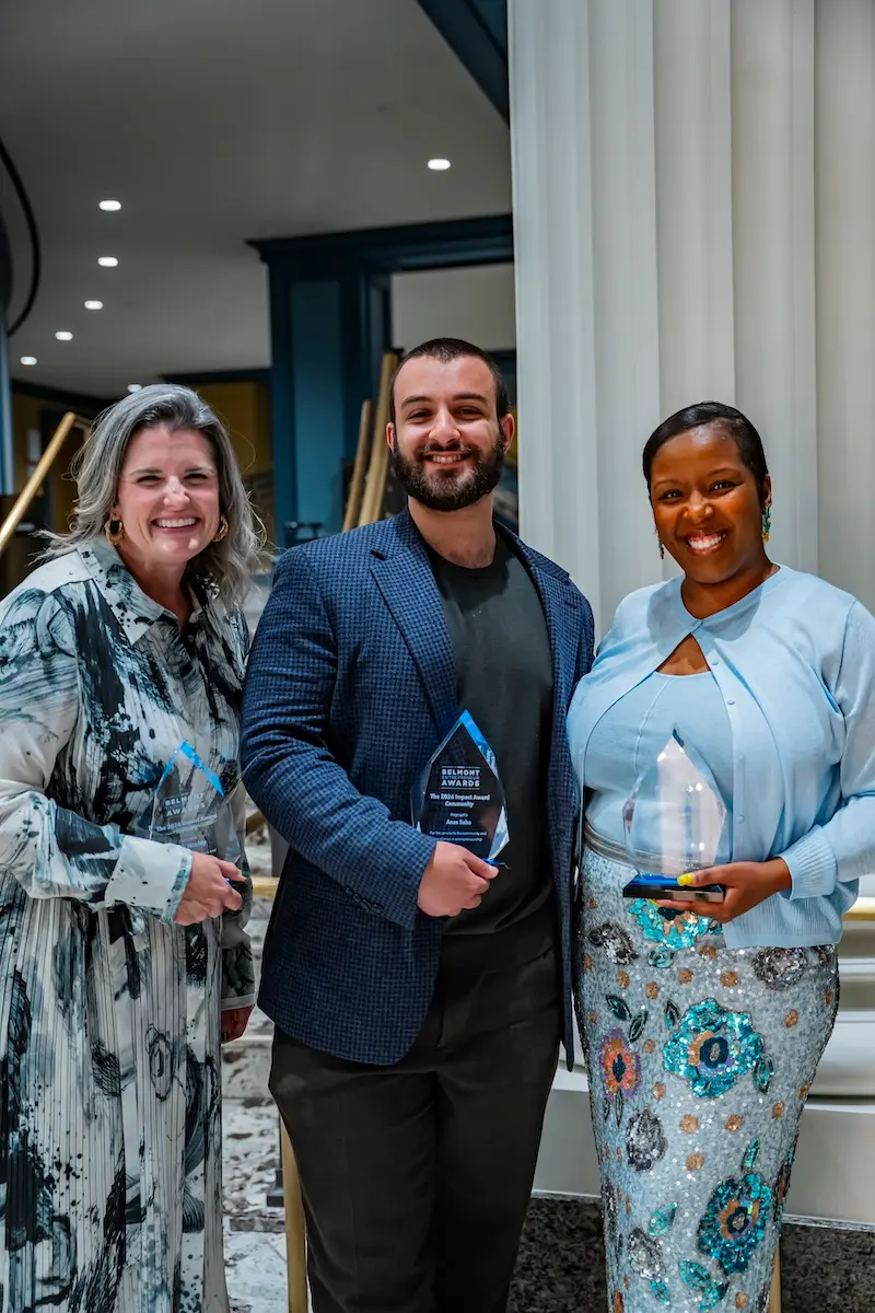 Sarah Worley, Anas Saba and Shana Berkley holding awards