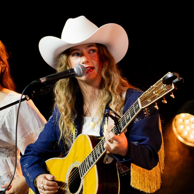 Country artist Carlisle Wright performing onstage