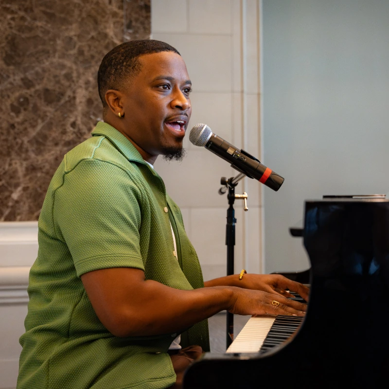 Brian Seay playing piano at chapel