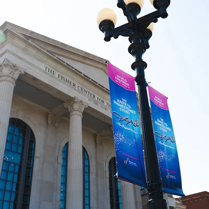 Fisher Center with Dolly Signs out Front