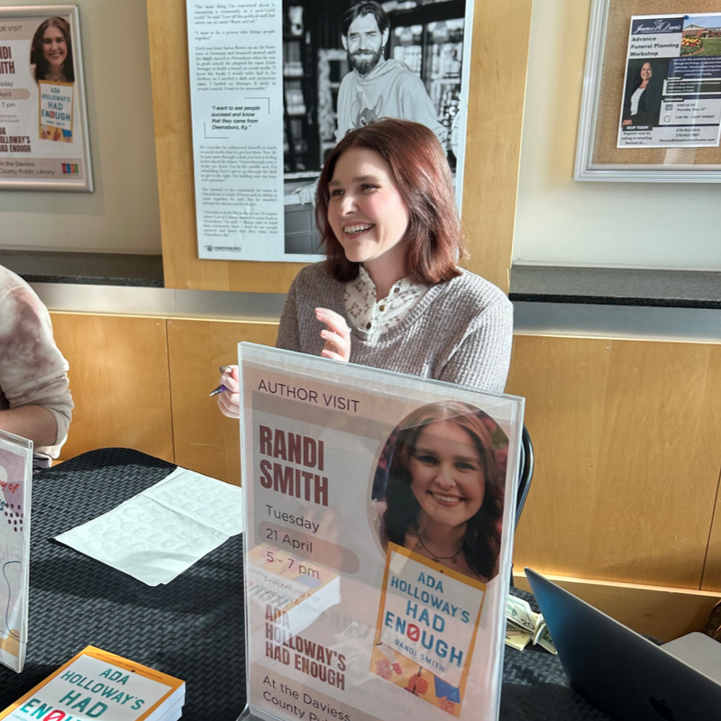 Randi Smith, author of "Ada Holloway's Had Enough," smiles at an author visit or book signing event.