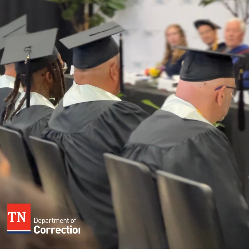 graduates sit waiting to cross the stage