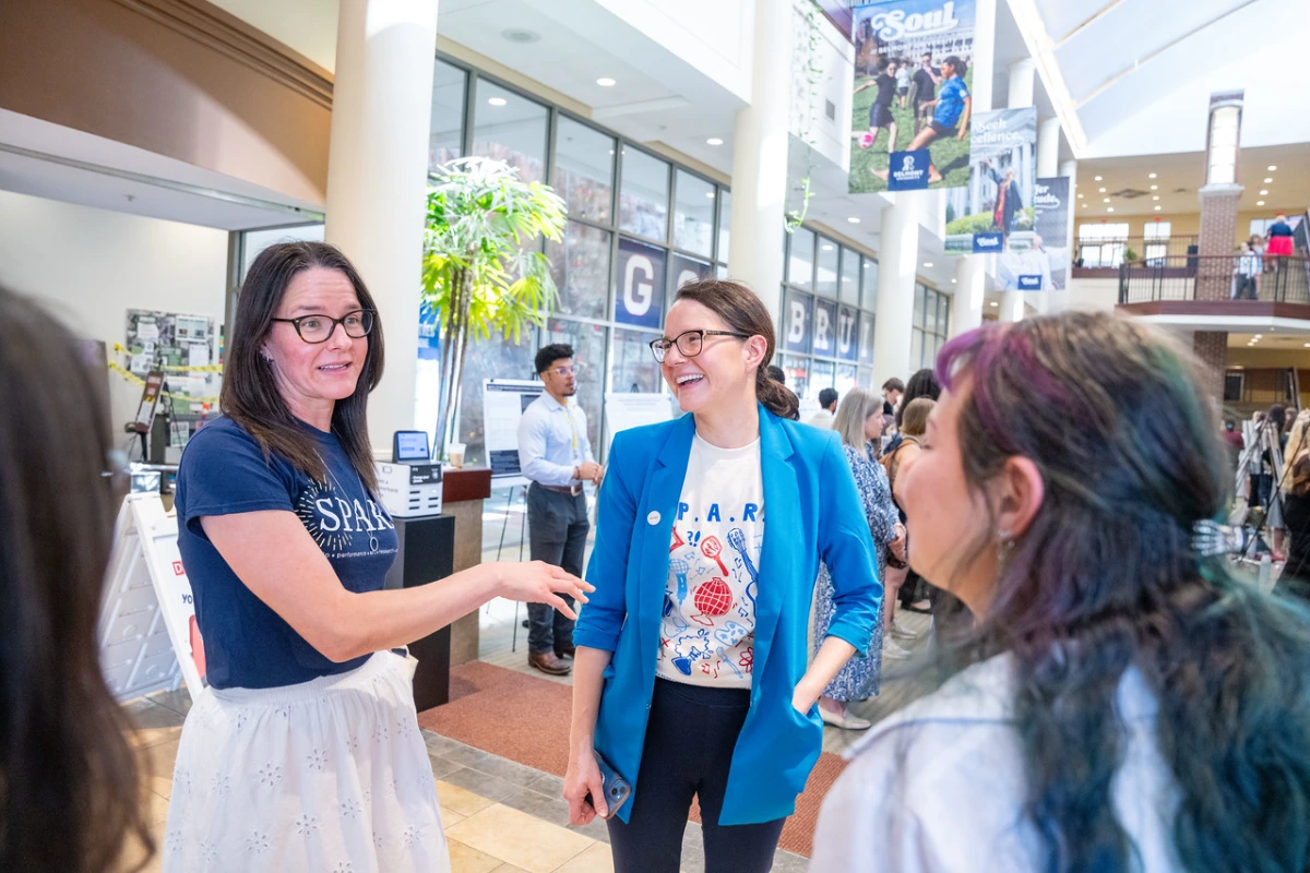 Drs. Beth Bowman and Rebecca Adams share a laugh