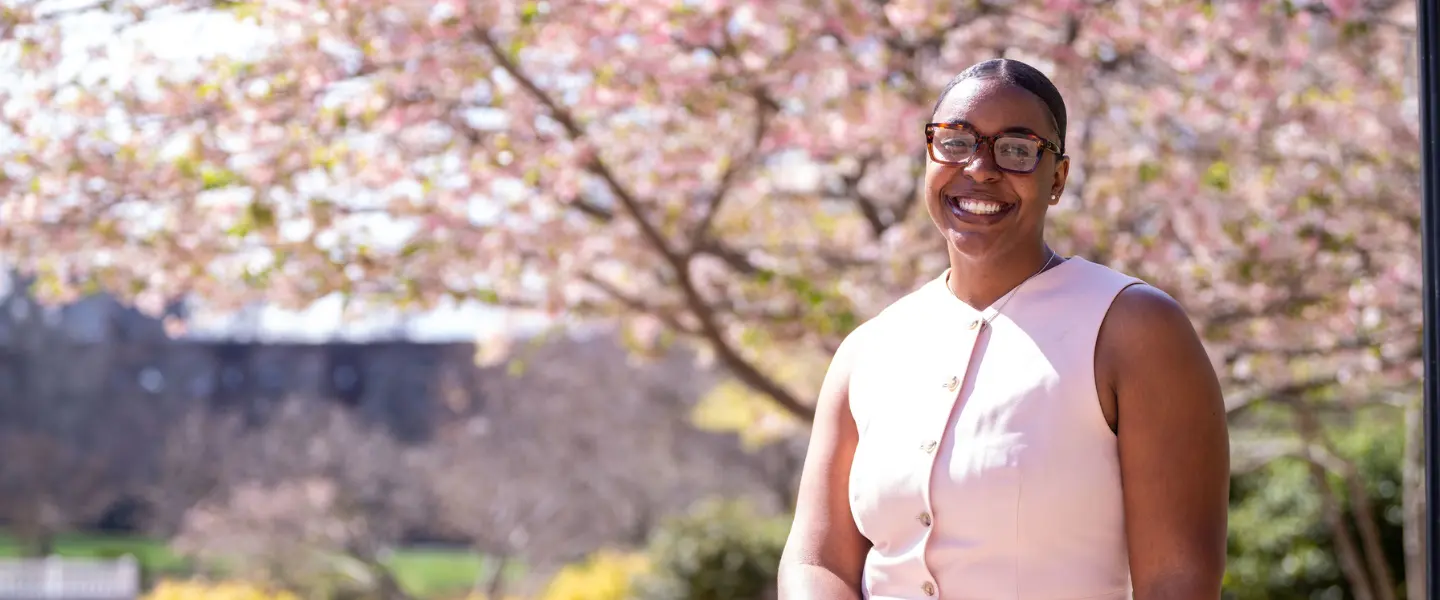 Caelyn Rolle sitting outside of belmont 