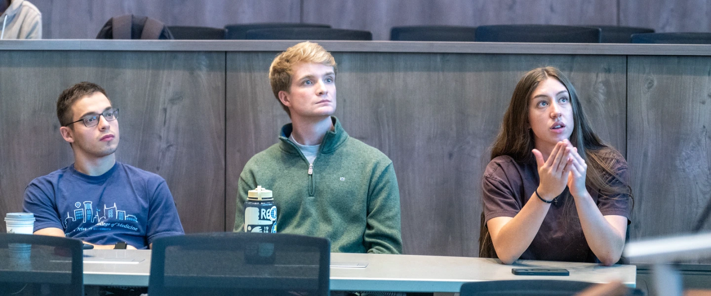 Kenzie Rushing with peers in class