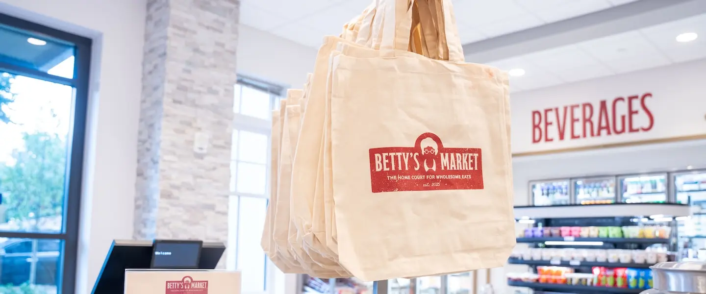 Tote bags with Betty's Market branding