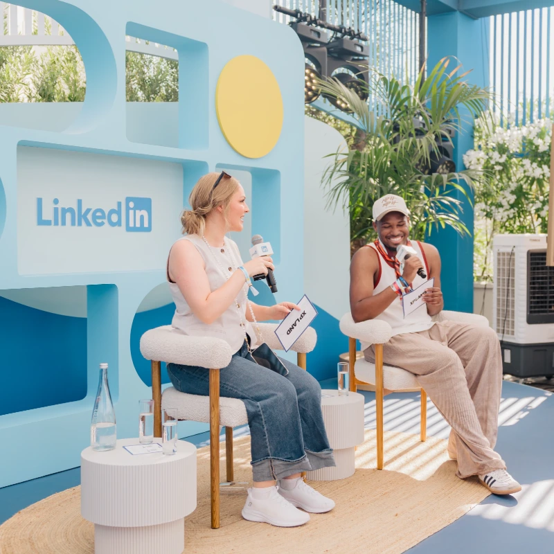 Abby in conversation with a fellow experiential marketer at Cannes Lions