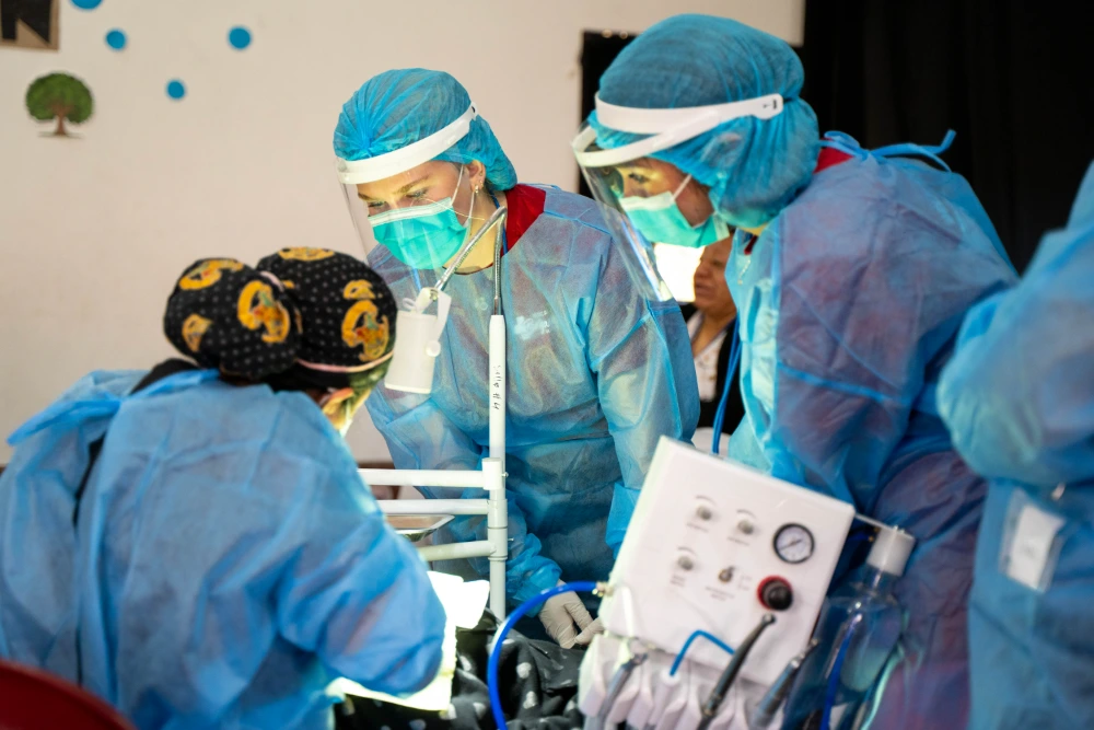 Students observing a procedure in progress