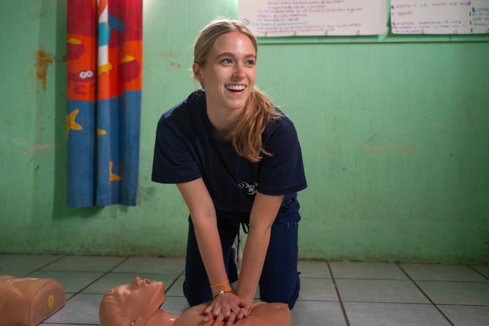 Ella Quincy giving CPR training