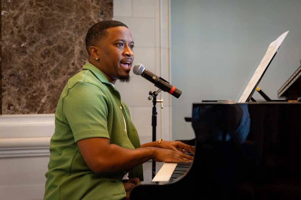Brian Seay playing piano at chapel