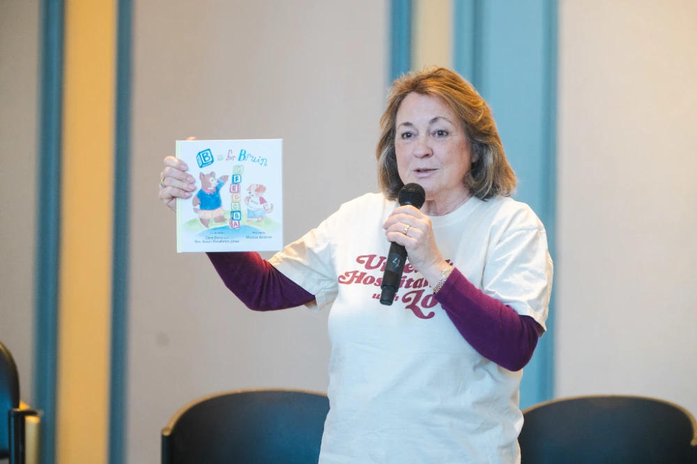 Susan Jones speaks at brunch